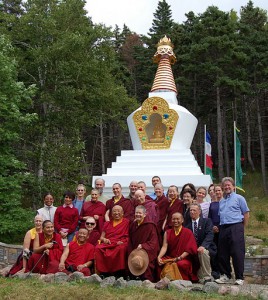Venerable Thrangu Rinpoche, his attendants, and some of teh Gampo Abbey community in front of the Stupa of Enlightenment, 2011